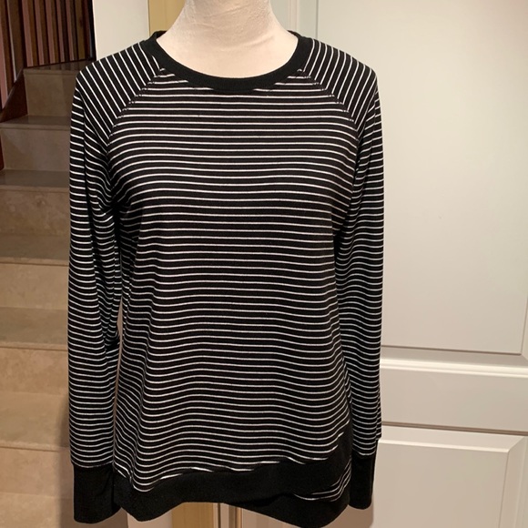 Danskin Tops - DANSKIN. tunic top features a long sleeve scoop neck pullover sweatshirt…